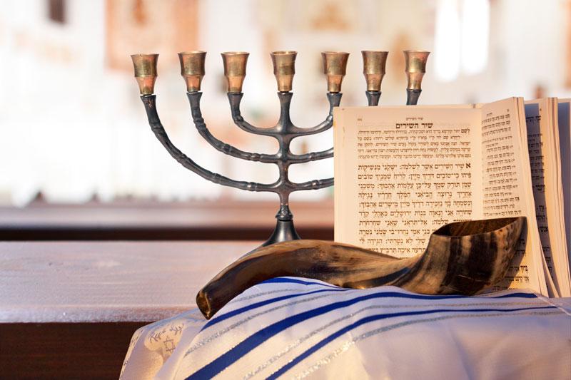 Shofar, Menorah, and Torah book